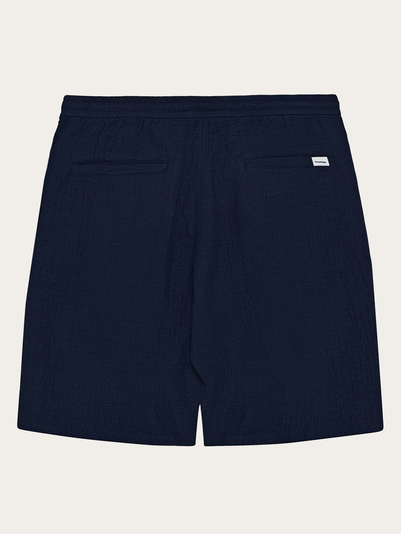 KnowledgeCotton Apparel - MEN FIG Loose fit dobby shorts - GOTS/Vegan Shorts 1483 Indigo